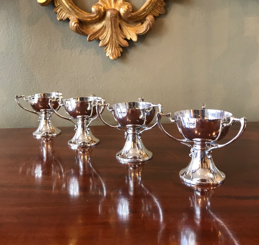 Set of Four Art Nouveau Silver Salts Cups in the form of Tygs
