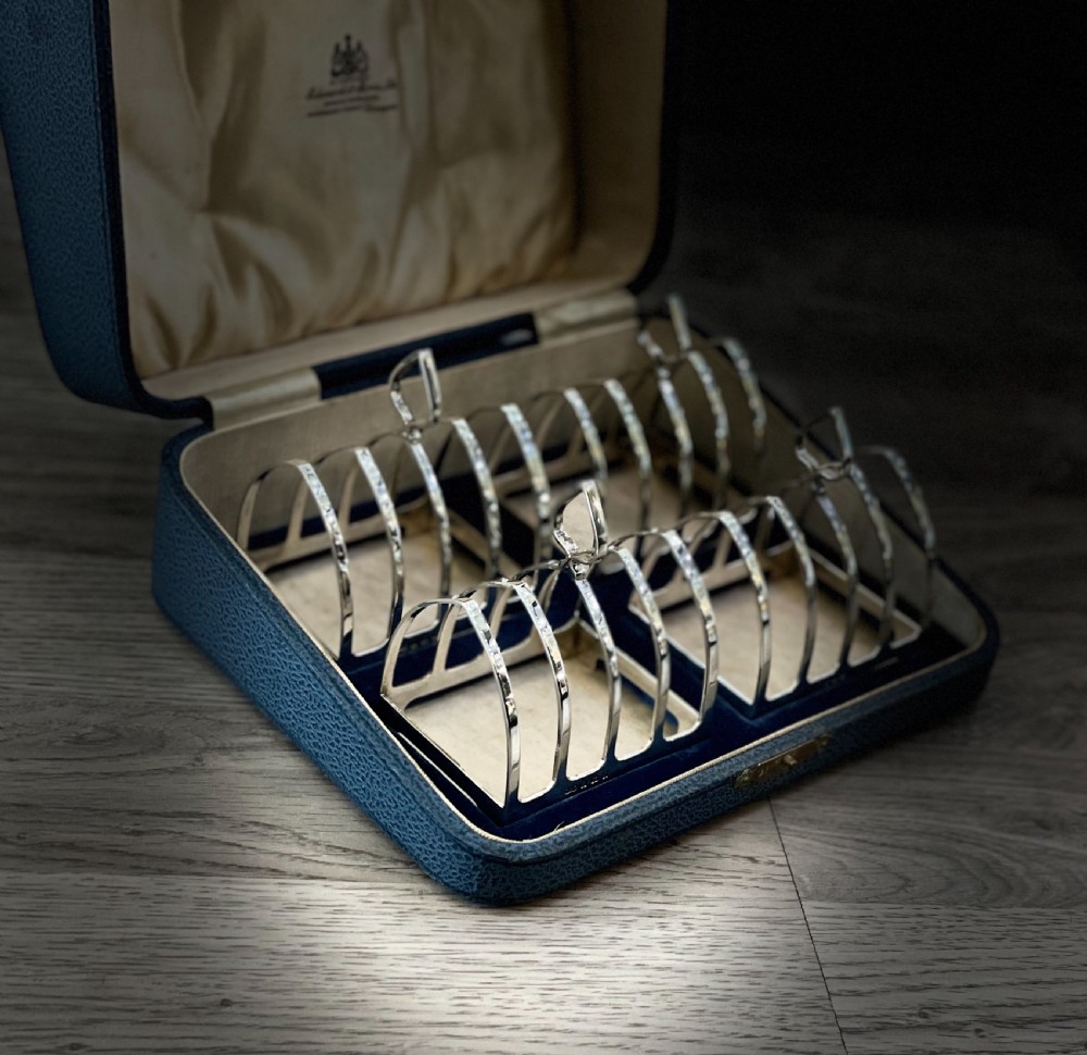A Boxed Set of Four George V Solid Silver Toast Racks  View VII