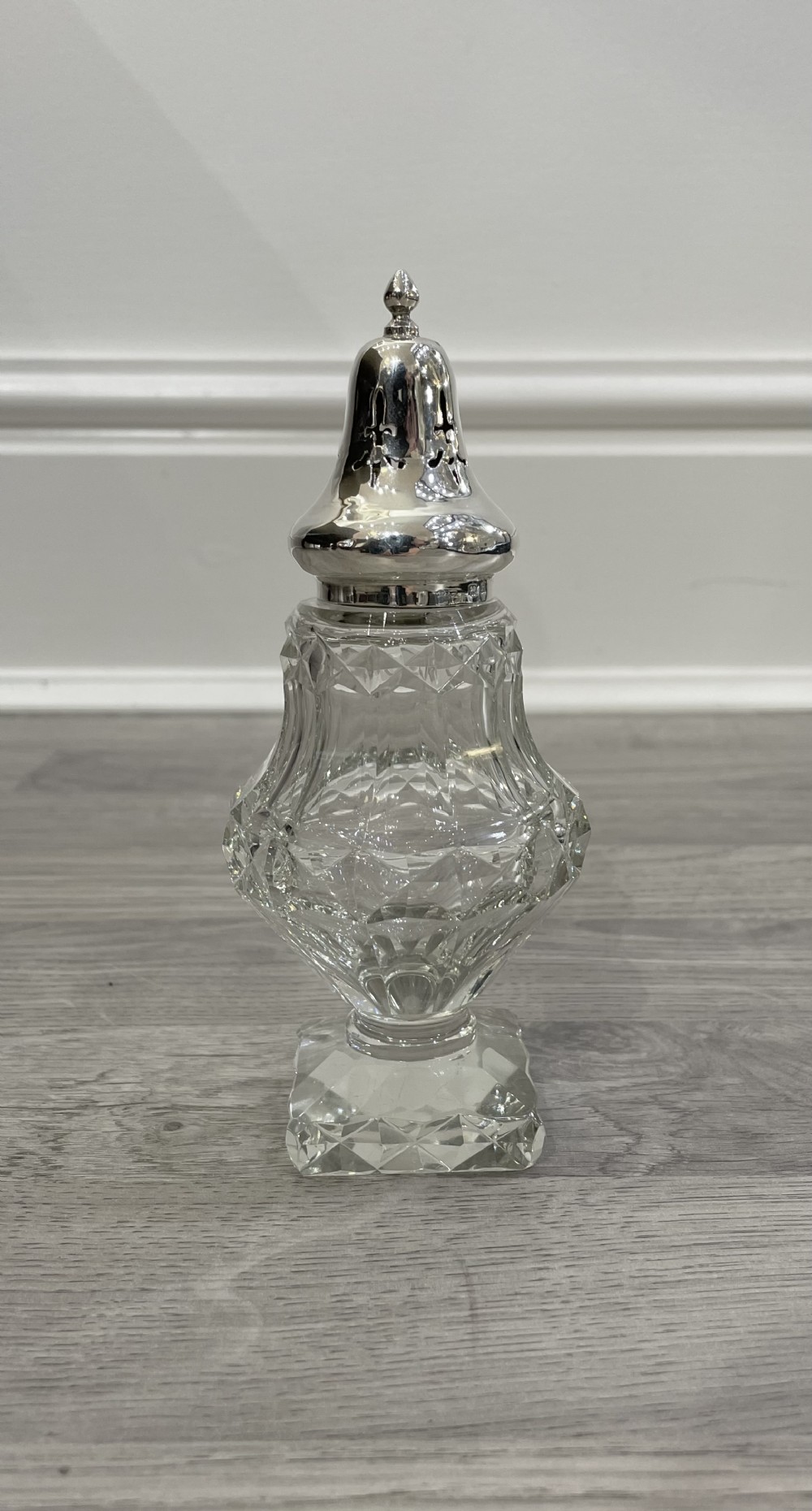Pretty George VI cut glass and silver sugar caster 