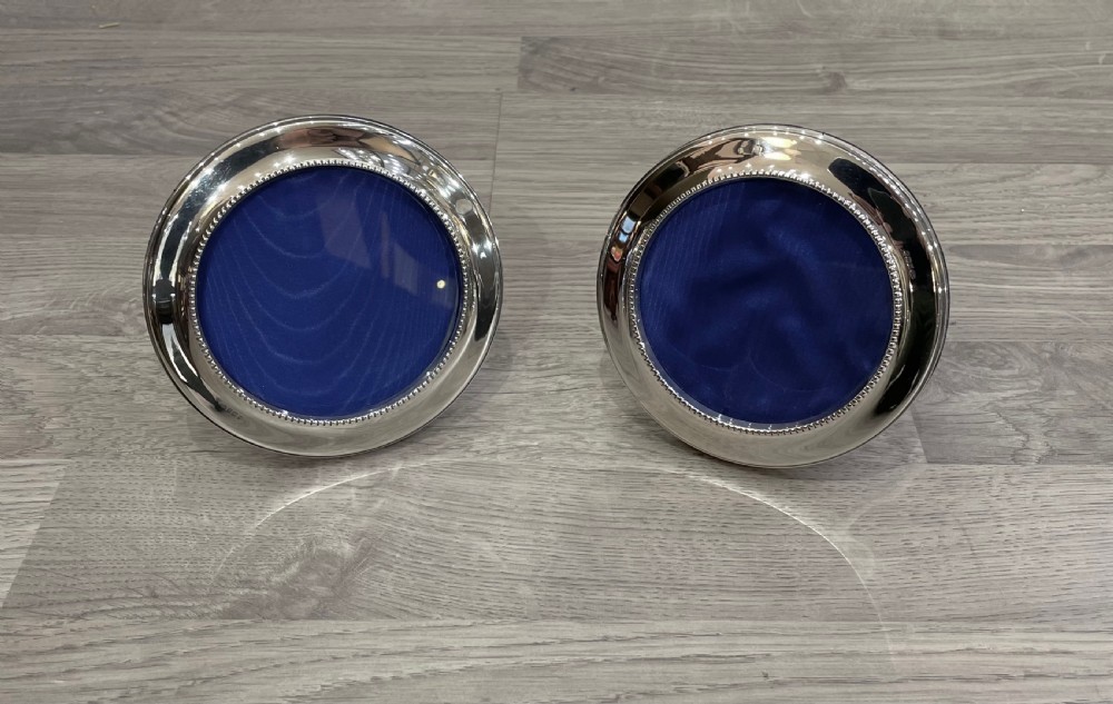 Pair of Circular Solid Silver Photograph Frames 