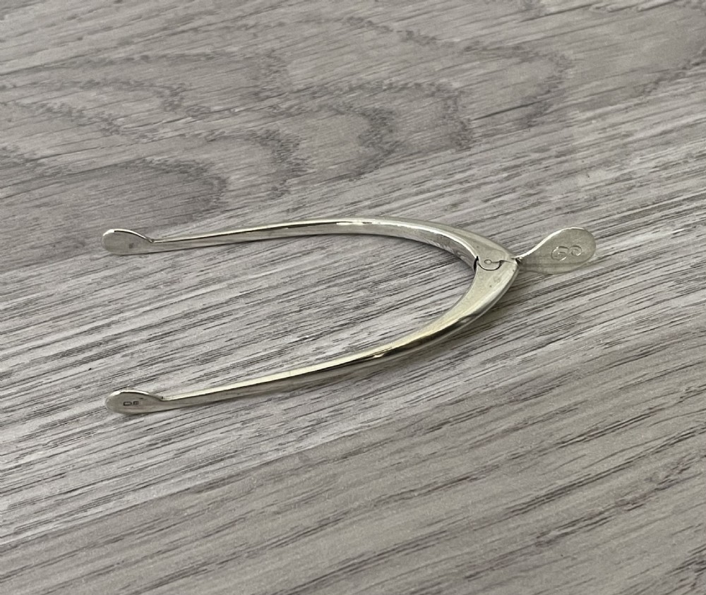 Pair of Wishbone Silver Sugar Tongs View II
