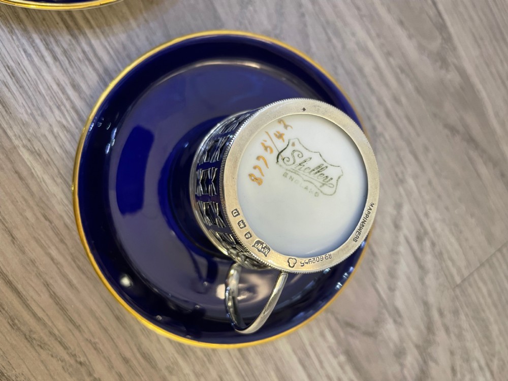 Pair of George V Demitasse Coffee Cups and Saucers with Silver Holders, Mappin & Webb View V