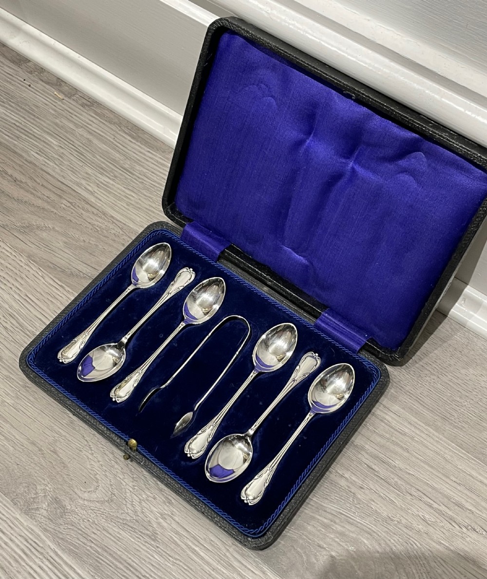 Set of Six George V Solid Silver Teaspoons and Sugar Tongs View II