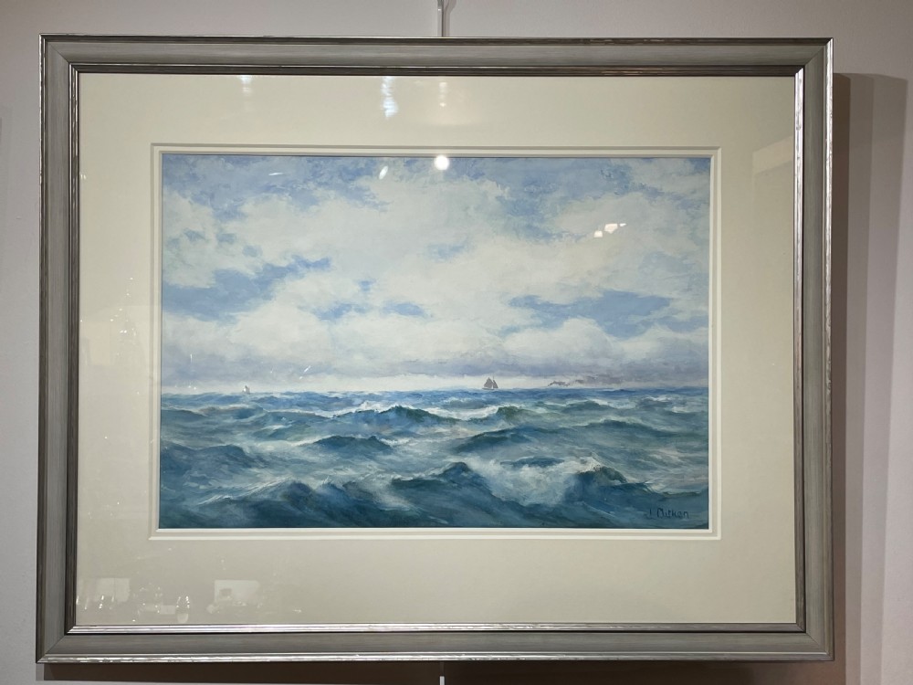 A framed watercolour painting depicting choppy blue ocean waves with distant sailing vessels under a cloudy sky. View III
