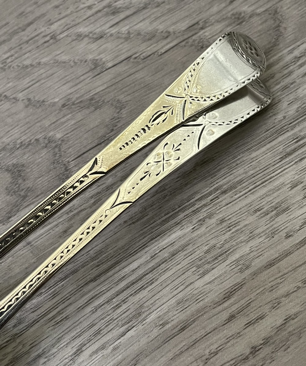Superb pair of George III solid silver serving spoons, 1795 View II