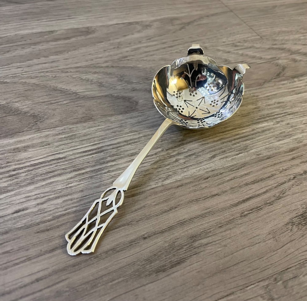 George VI solid silver tea strainer, 1939 View IV