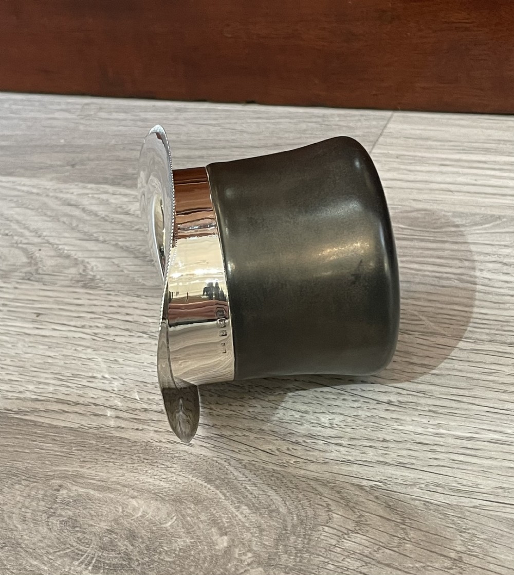 A rare Top Hat silver topped Vesta holder Striker View II