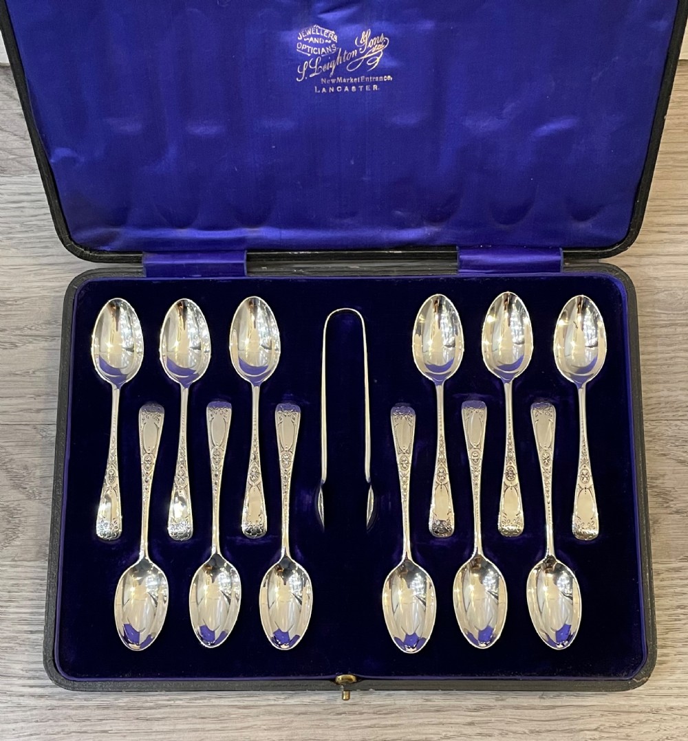 Good Set of 12 George V Solid Silver Teaspoons and Sugar Tongs View IV