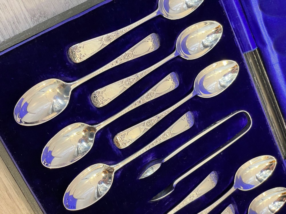 Good Set of 12 George V Solid Silver Teaspoons and Sugar Tongs View V