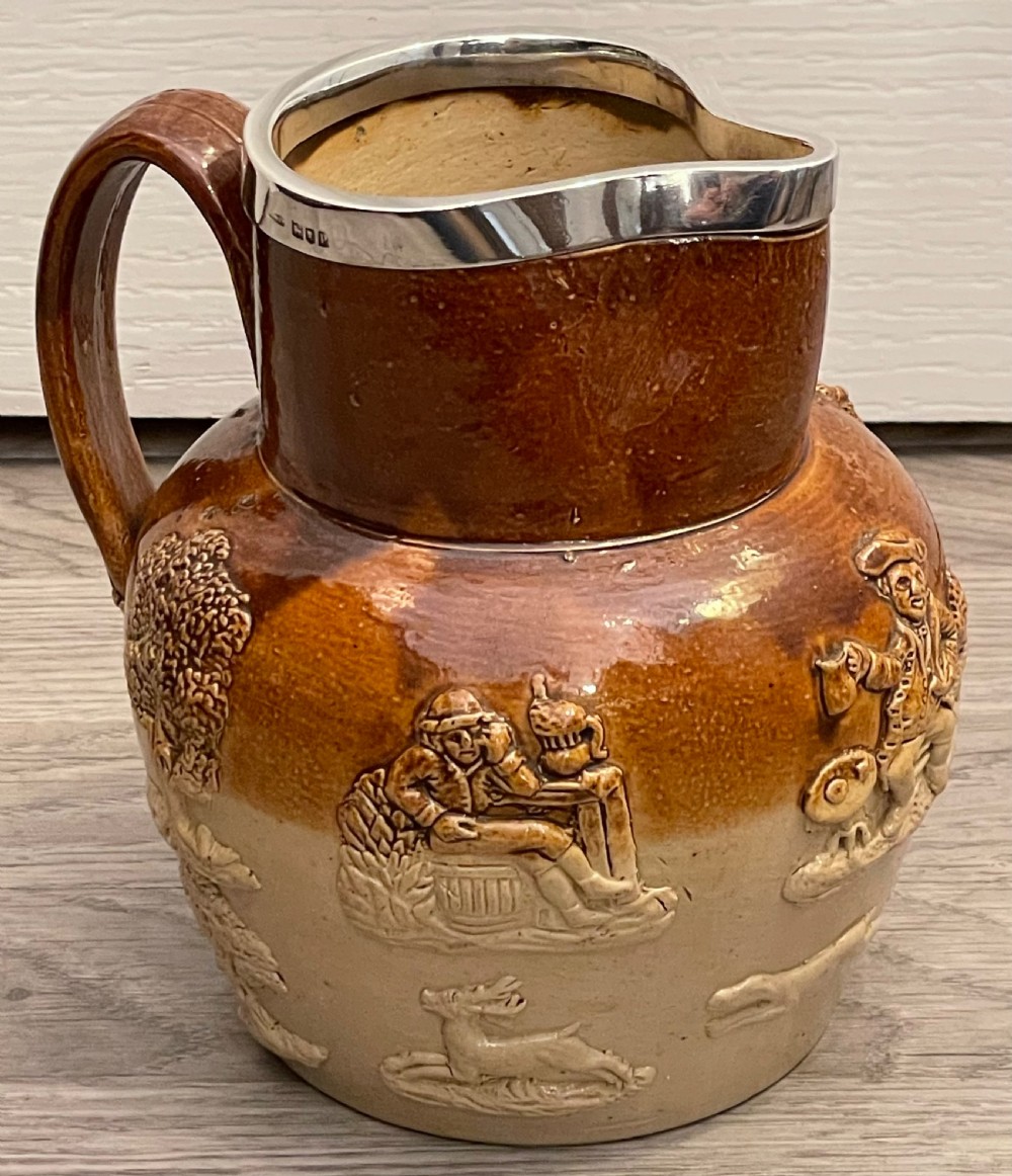 Large Doulton Lambeth Stoneware Jug with Silver Rim View V