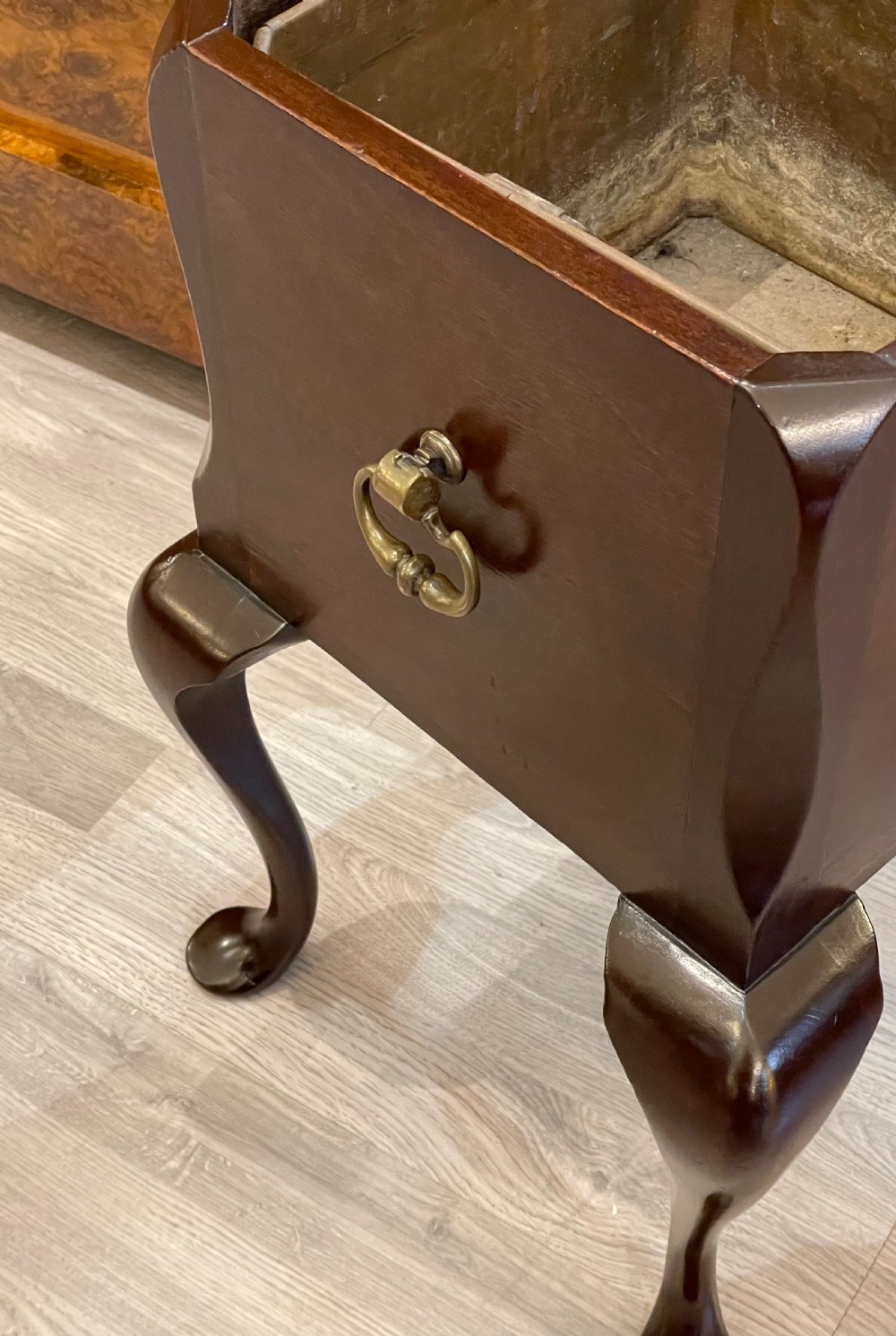 A square dark mahogany Georgian jardiniere featuring cabriole legs, brass side handles, and a removable metal liner. View II
