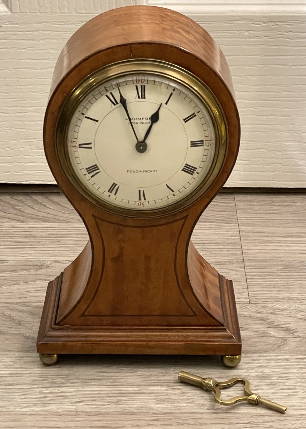 Edwardian Satinwood Balloon Clock by L Mumford, London 