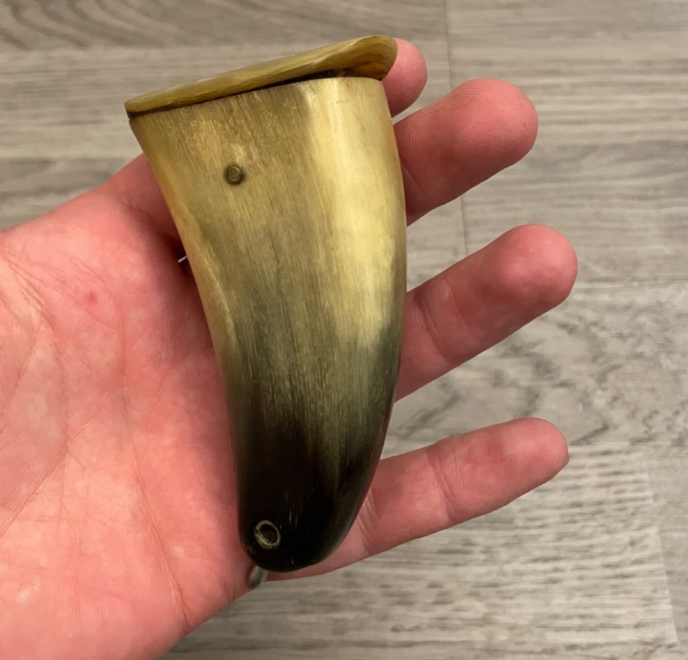 A 19th-century Scottish horn snuff mull crafted from polished natural horn with tonal variation from honey yellow to dark brown. View VII