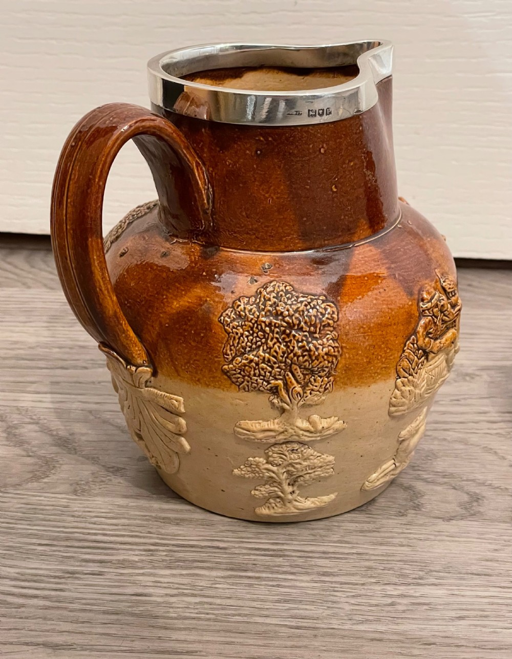 Two Victorian Doulton Lambeth Stoneware Jugs with Silver Rims View III