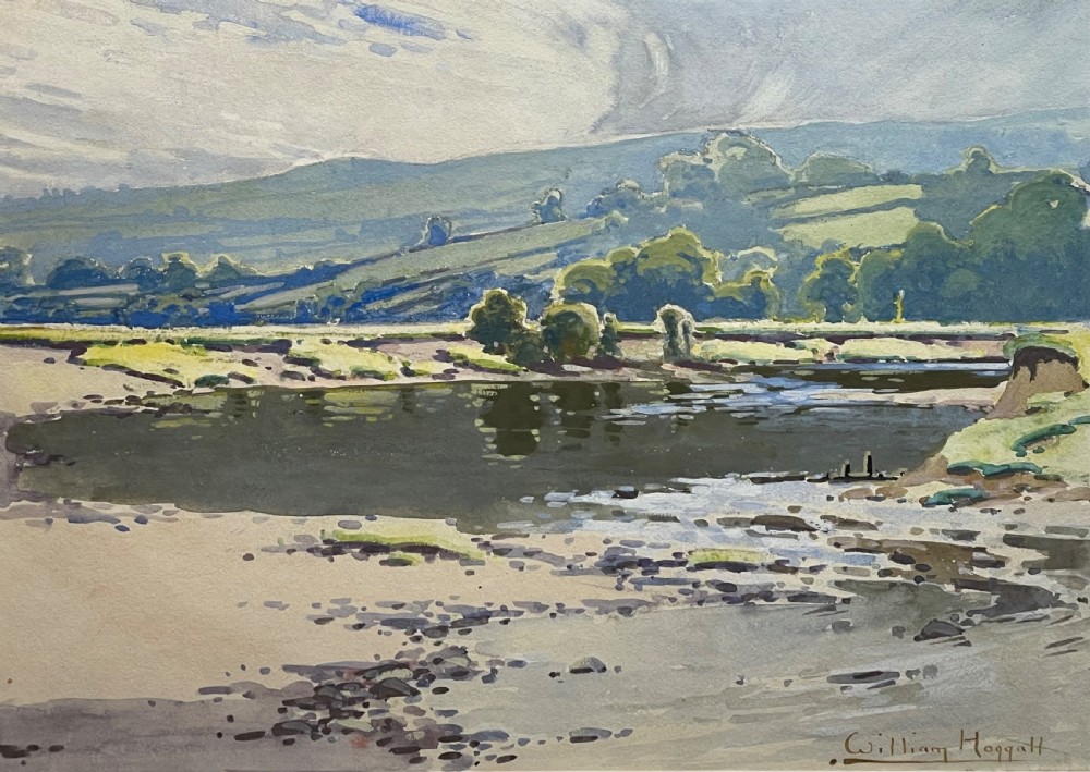 A framed watercolour painting depicting a river and rolling green hills under a cloudy sky, housed in a cream mount and metallic gold frame. View II
