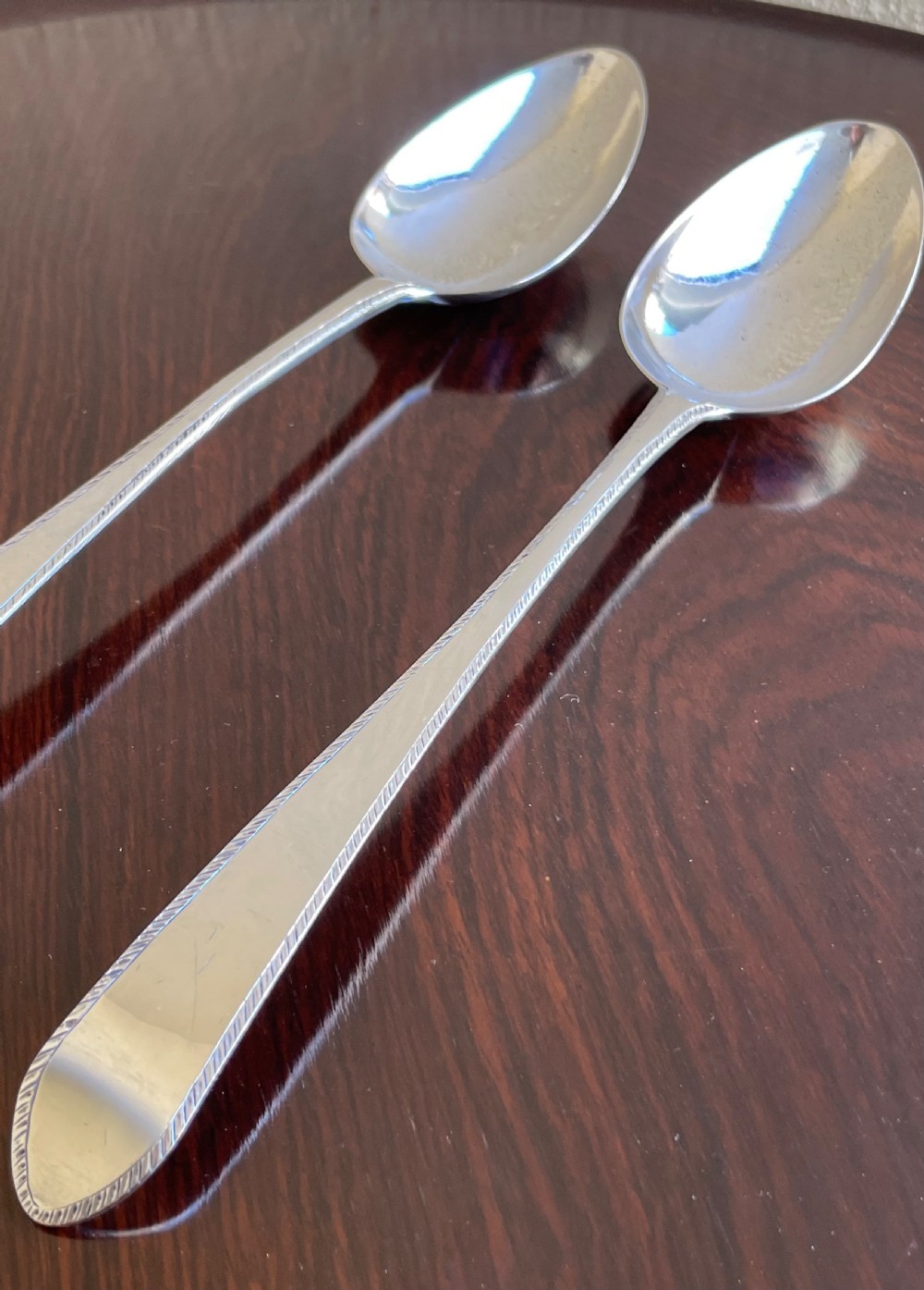 Pair of Irish Silver Feather Edge Basting Serving Spoons  View II