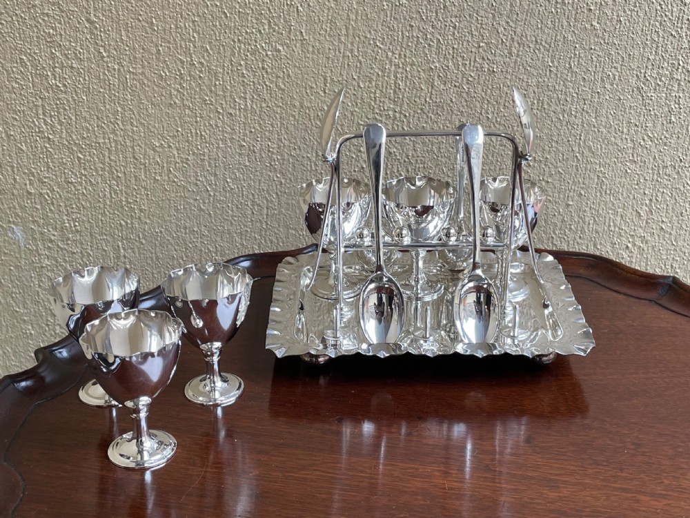 George V silver plated Egg Cruet Set for Six View II