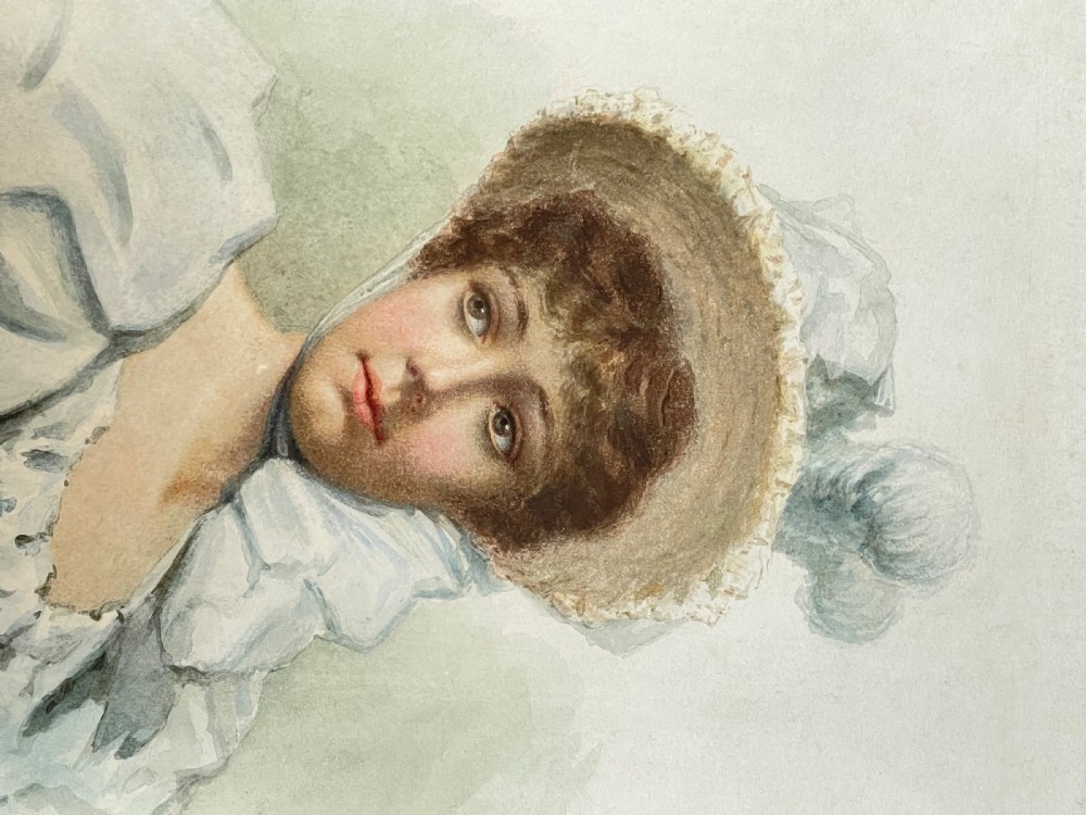 Framed Edwardian watercolour portrait painting depicting a woman wearing a bonnet and blue dress, signed L Sommer and dated 1900. View IV