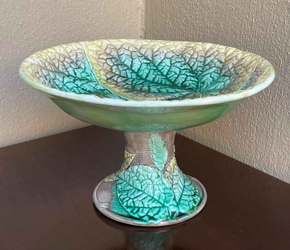 A Victorian majolica pedestal comport bowl featuring moulded green and yellow begonia leaf patterns with a matching leaf-textured stem. View III