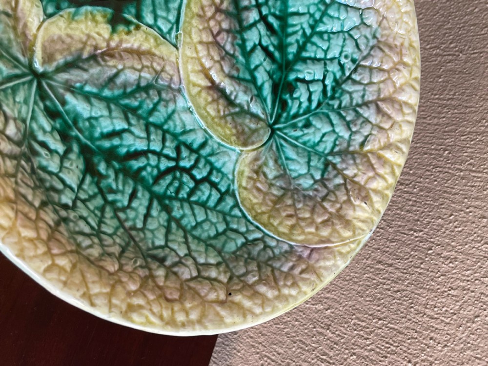 A Victorian majolica pedestal comport bowl featuring moulded green and yellow begonia leaf patterns with a matching leaf-textured stem. View IV