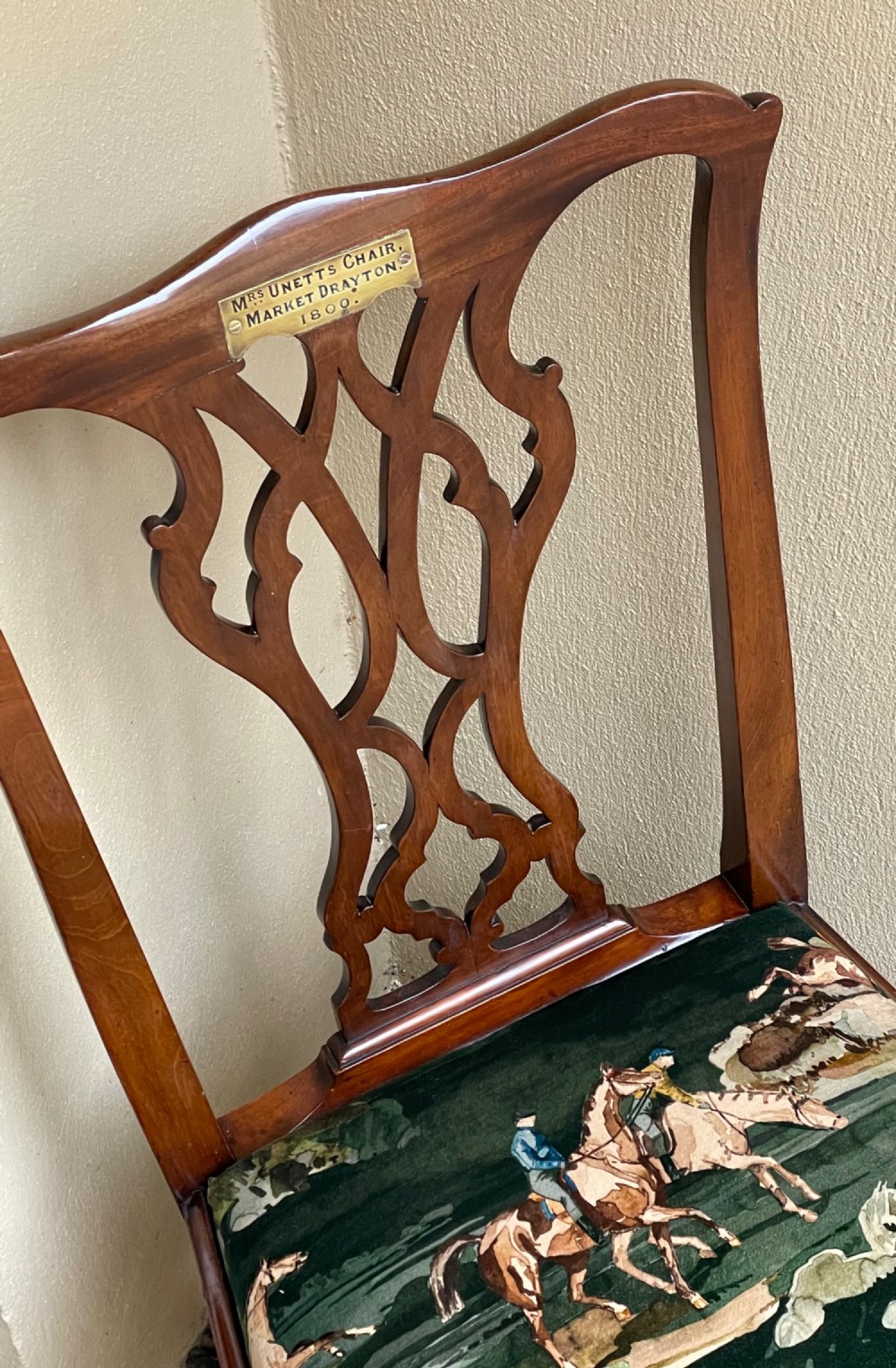A Georgian mahogany side chair featuring a pierced back splat, an engraved brass inscription plaque on the top rail, and a printed equestrian fabric seat pad. View II