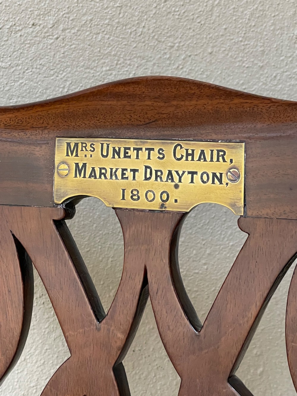 A Georgian mahogany side chair featuring a pierced back splat, an engraved brass inscription plaque on the top rail, and a printed equestrian fabric seat pad. View III