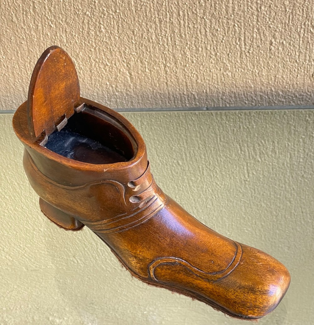 A late Victorian hand-carved wooden snuff box in the shape of a laced shoe with a sliding top lid. View IV