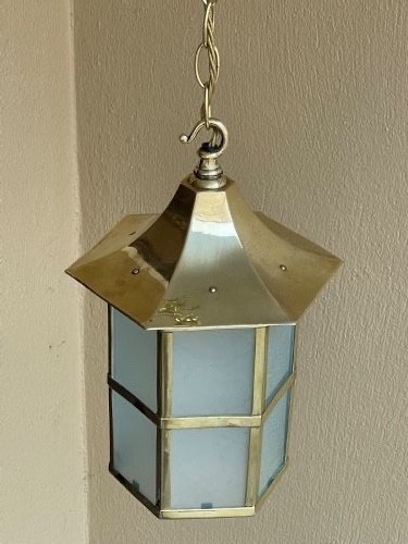 An Edwardian hexagonal brass hall lantern featuring frosted glass panels and a chain hanging loop. View III