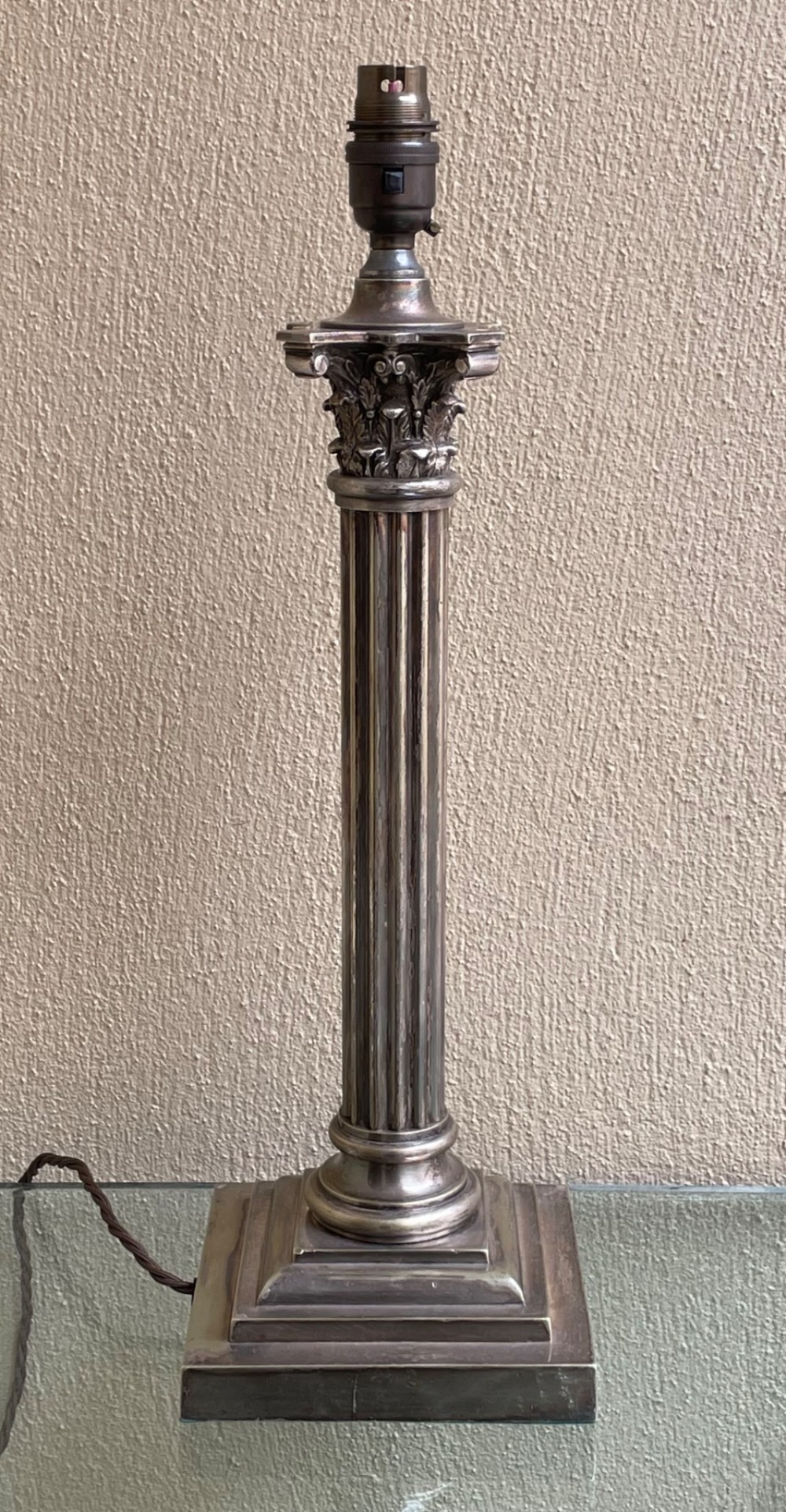 A Victorian silver-plated table lamp featuring a fluted Corinthian column on a stepped square pedestal base. View III