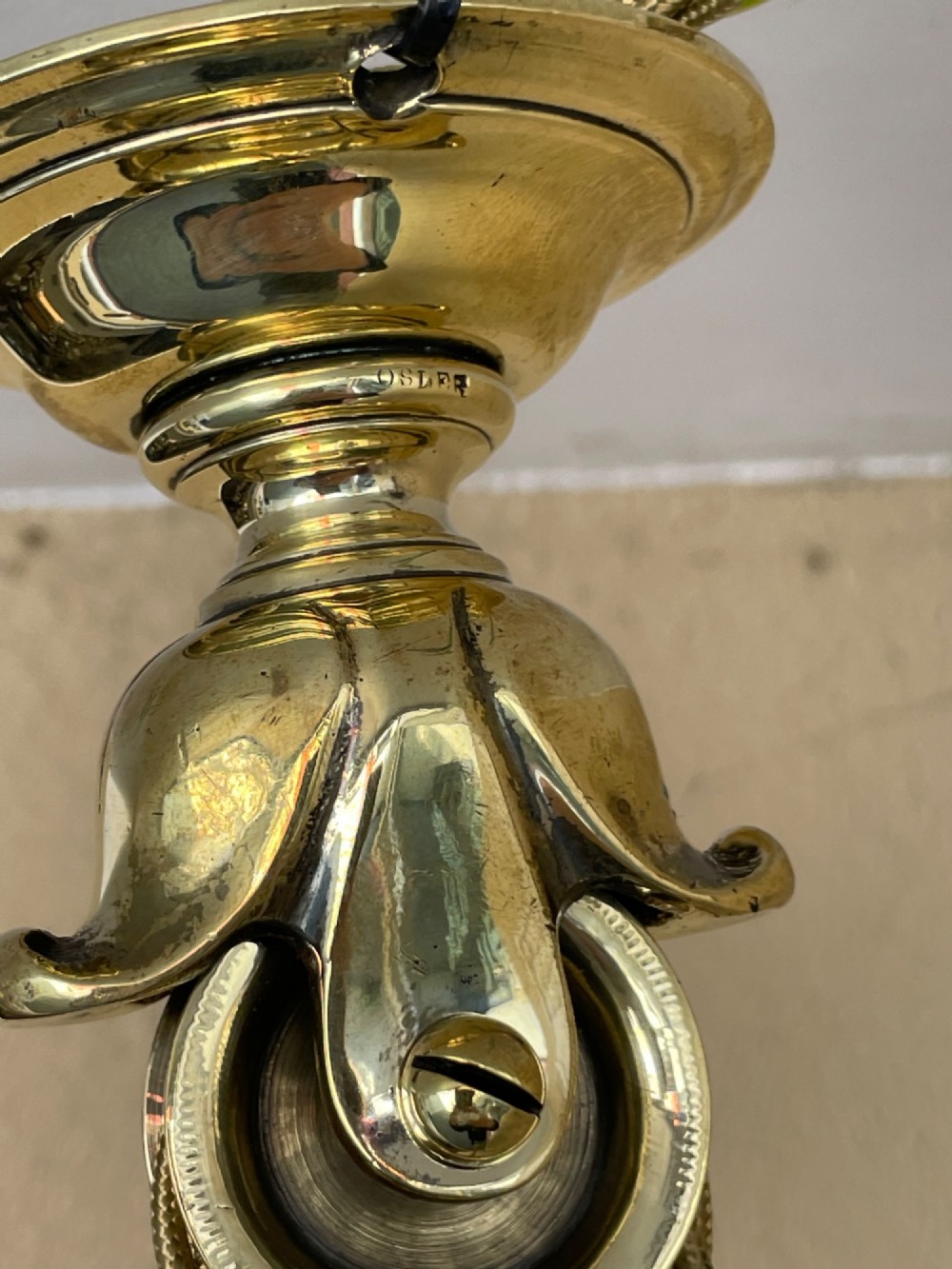 A Victorian brass rise and fall pendant light featuring a pulley mechanism, brass counterweight, twisted cord, and frosted glass shade. View IV
