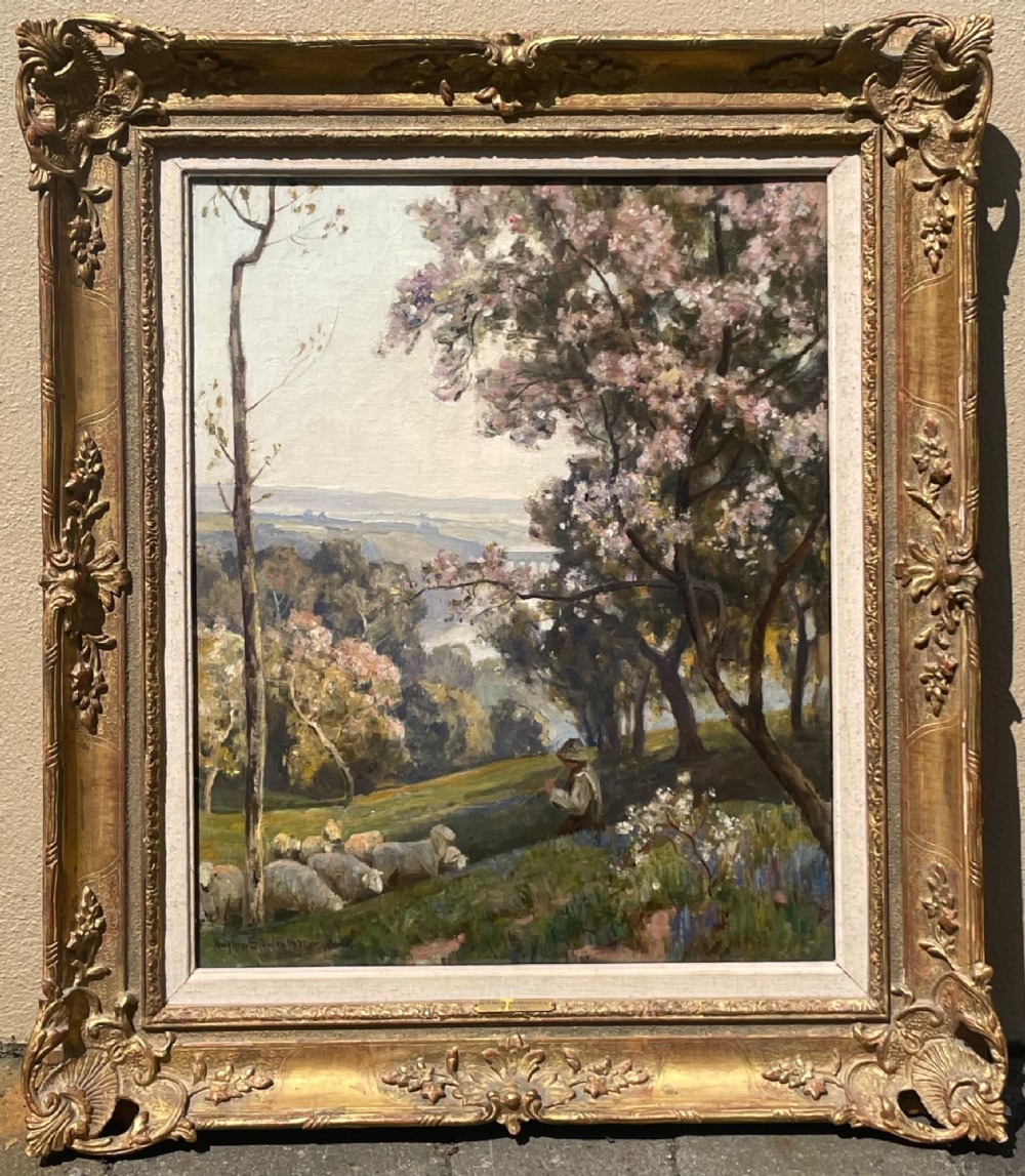 An impressionistic landscape oil painting depicting a shepherd seated beneath blossoming trees with sheep grazing on a green hillside overlooking a distant valley. View III