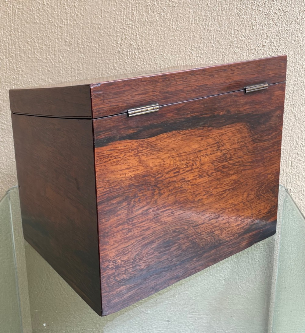 A rectangular dark wood campaign correspondence box featuring a hinged top, a brass keyhole escutcheon, and a lower drawer with a flush brass handle. View VIII