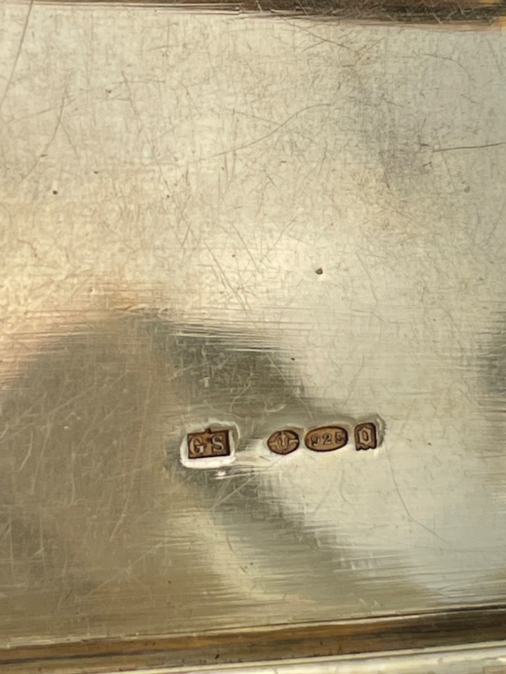An Art Deco rectangular silver card case featuring turquoise sunburst guilloche enamel and a triangular gemstone clasp. View XI