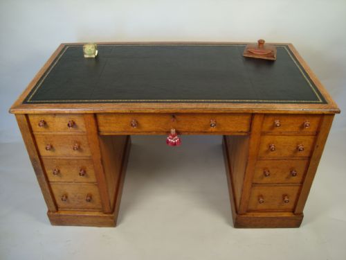 a quality victorian oak desk with 'wellington chest' locking system - CATEGORY: ANTIQUE DESKS - DATED VICTORIAN