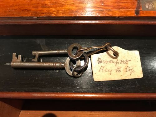 A FIGURED WALNUT VICTORIAN DAVENPORT - ADDITIONAL PHOTO 6
