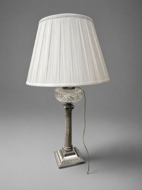 A HANDSOME SILVER VICTORIAN LAMP