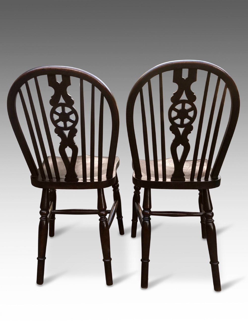 A Pair of Late Georgian Wheel Back Windsor Kitchen Chairs In Oak & Elm View III