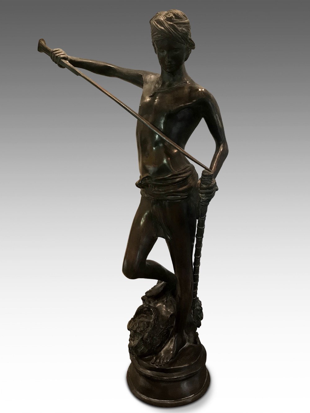 A Large Bronze of David slaying Goliath C1850