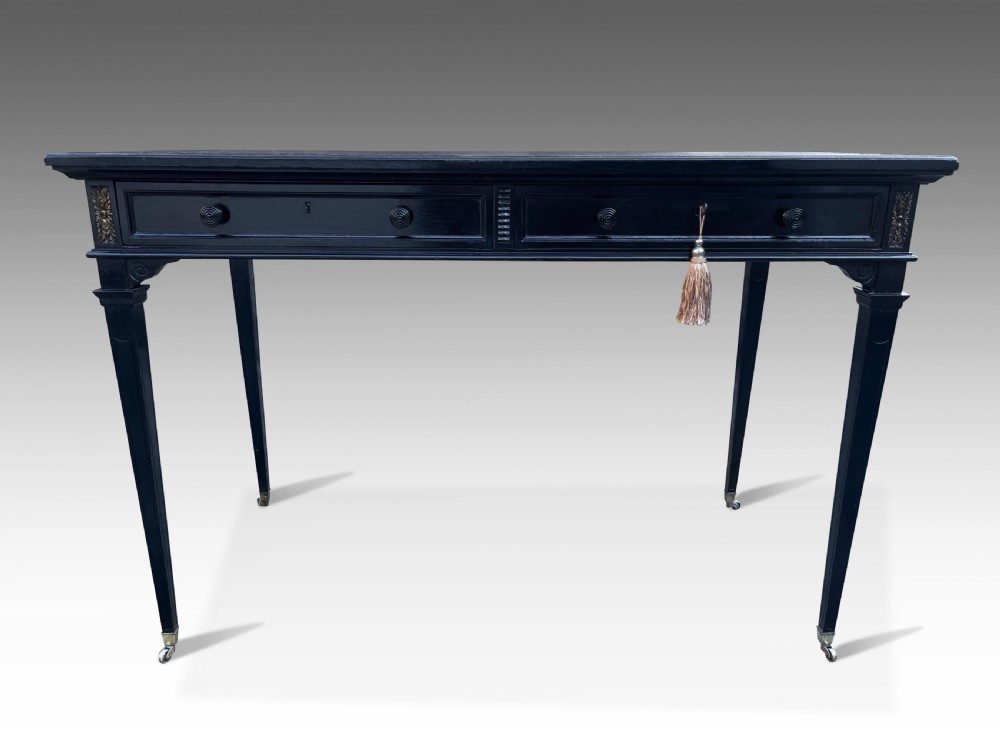 An Elegant French Ebonised Writing Table View V
