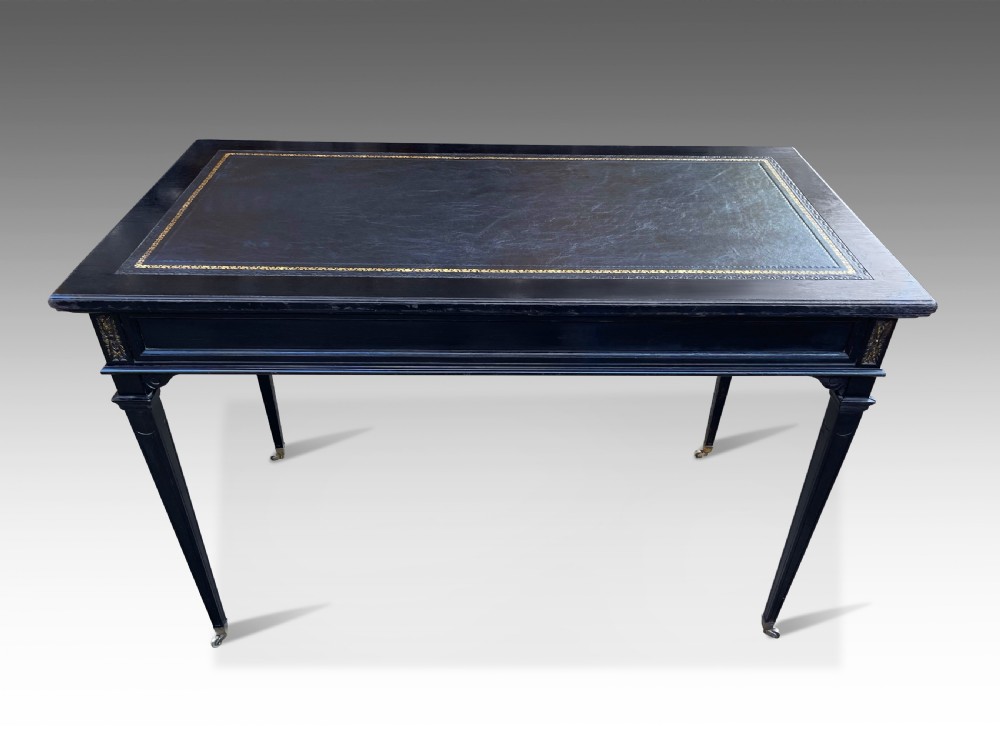 An Elegant French Ebonised Writing Table View VI