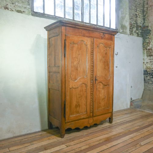 an 18th century french parquetry inlaid chestnut armoire - CATEGORY: ANTIQUE CUPBOARDS - DATED 18TH CENTURY
