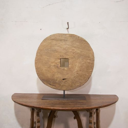 18th century ox wheel mounted on stand - CATEGORY: ANTIQUE MISCELLANEOUS - DATED 18TH CENTURY