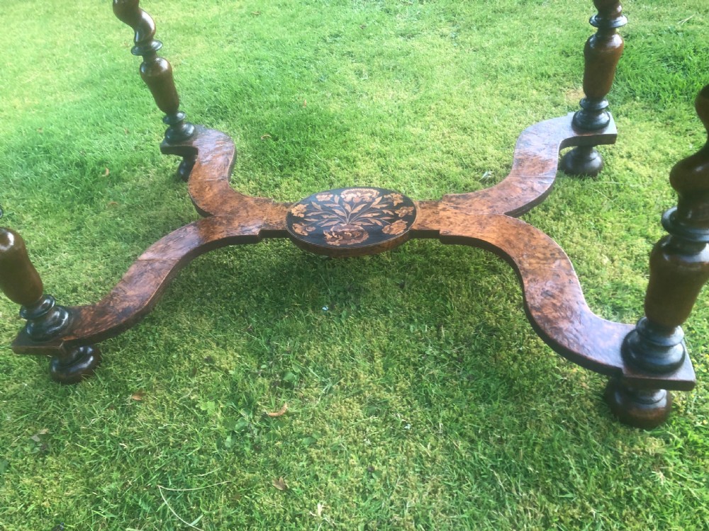 A late 17th-century William and Mary walnut side table featuring elaborate floral marquetry inlays on the rectangular top, spiral-turned legs, and a shaped X-stretcher. View IV