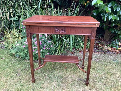EDWARDIAN MAHOGANY GAMES TABLE