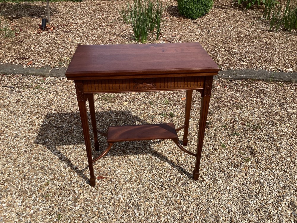 Antique mahogany games table