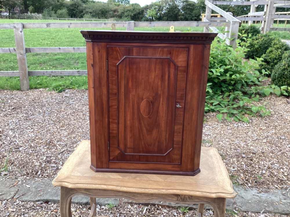 Georgian oak and mahogany corner cupboard