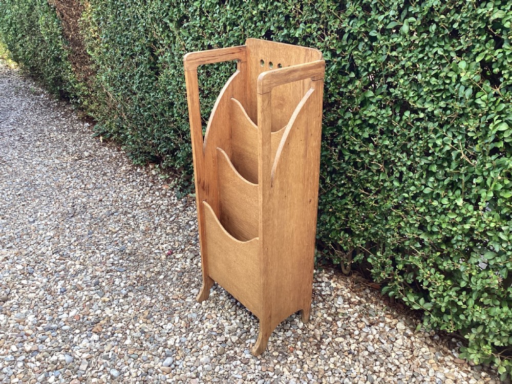 An Arts and Crafts oak magazine paper rack View III