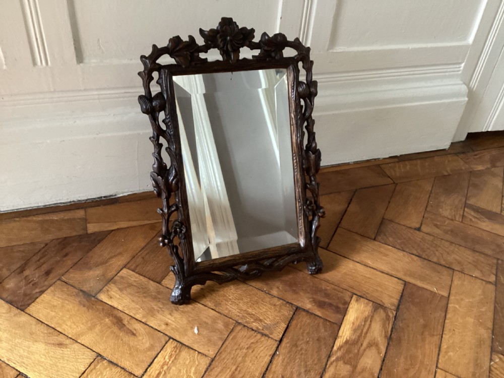 Antique Black Forest carved vanity easel mirror