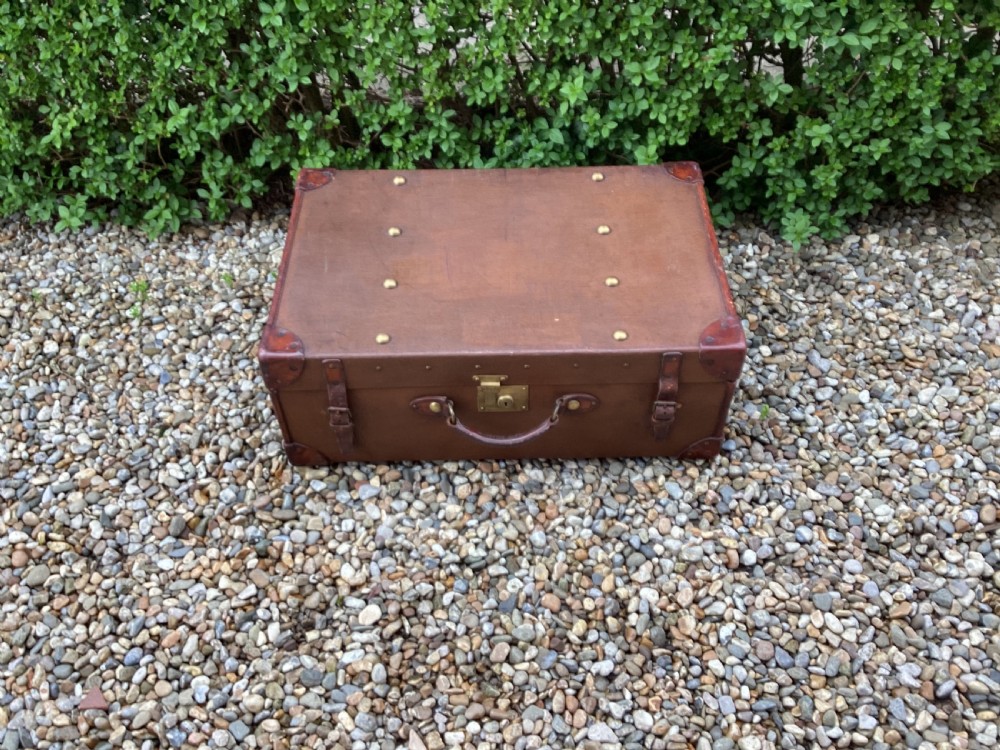 Antique Finnegans  leather and fabric travel trunk