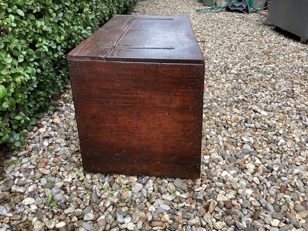 A rectangular dark mahogany wooden bible box featuring brass strap hinges on top and a keyhole with a decorative tassel on the front. View III